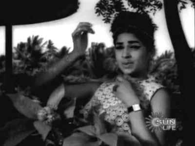 Ennam Pola Kannan Lyrics Meaning – Poovum Pottum | P. Susheela