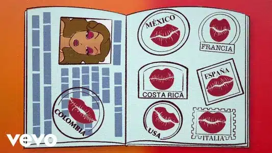 Viajando Por El Mundo Lyrics English Meaning: Tropicoqueta | Karol G | Manu Chao