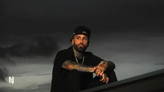 Olvídala Lyrics English Meaning — Bohemio | Nicky Jam