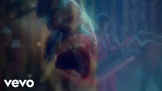 Una Muerte Ideal Lyrics {English Translation} | Grande Amore | Rodrigo Cuevas